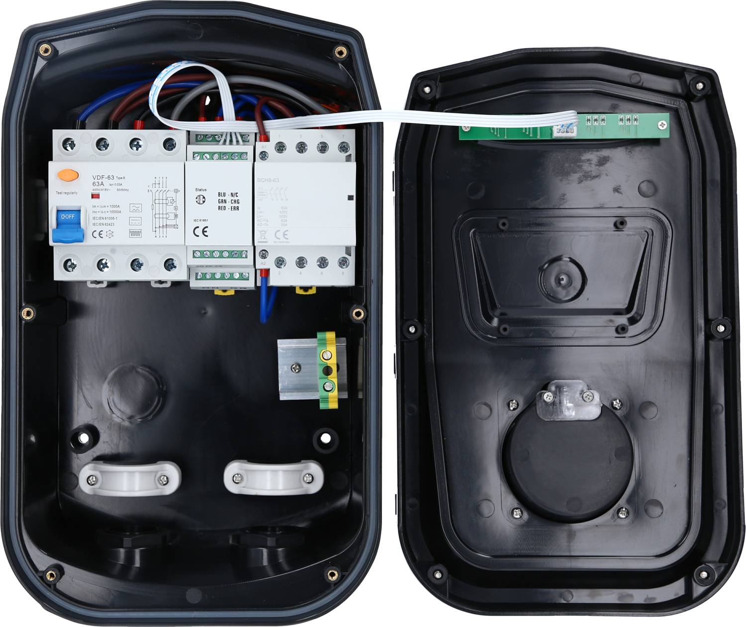 An opened electrical enclosure with visible circuit boards and cables. Two mounting brackets are visible inside.
