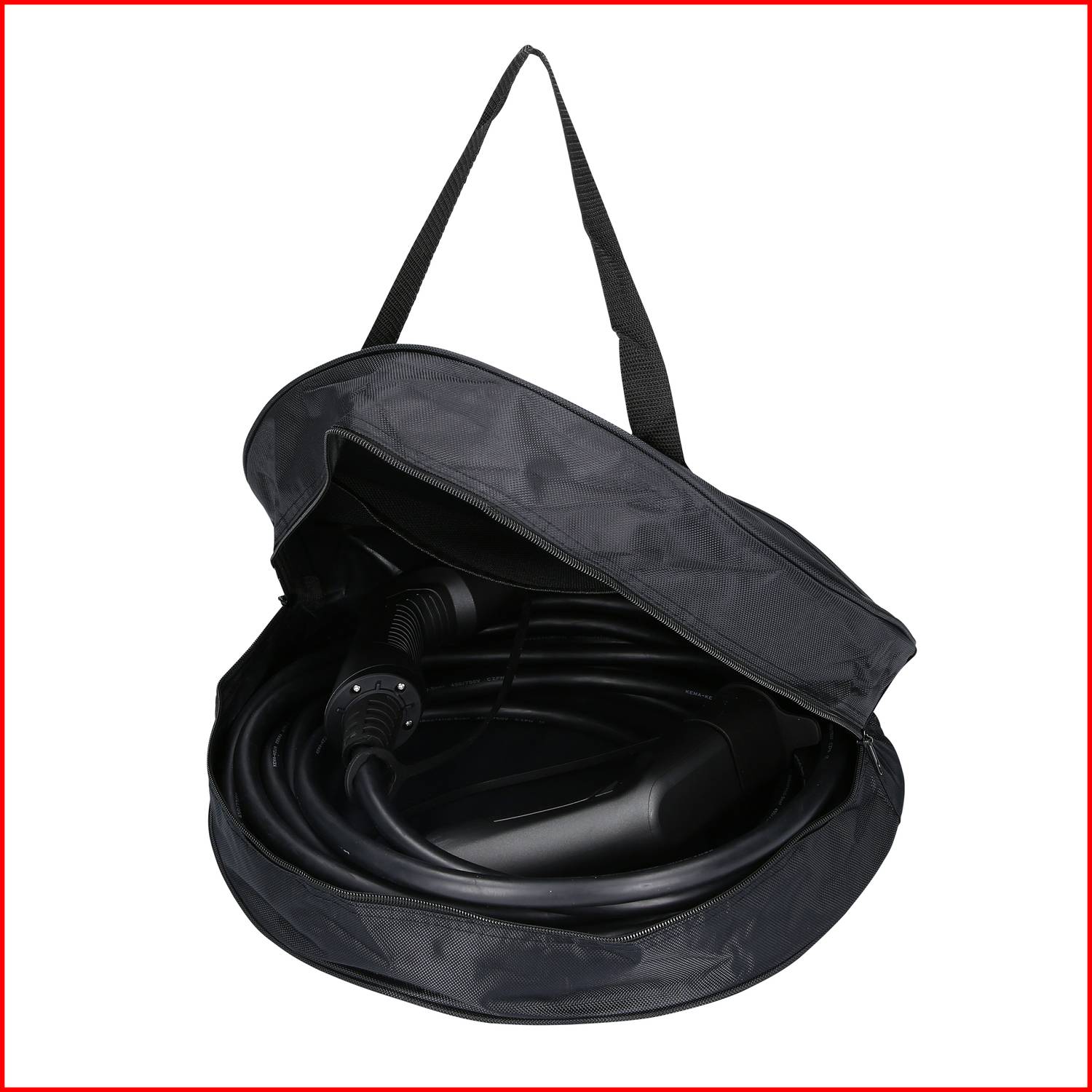 An open black carrier bag contains a coiled electrical charging cable, ready for use.