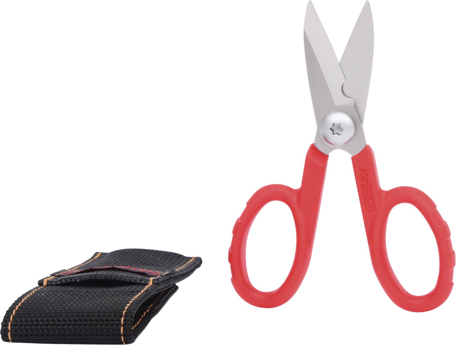 A red pair of scissors with black handles lies next to a black fabric bag.