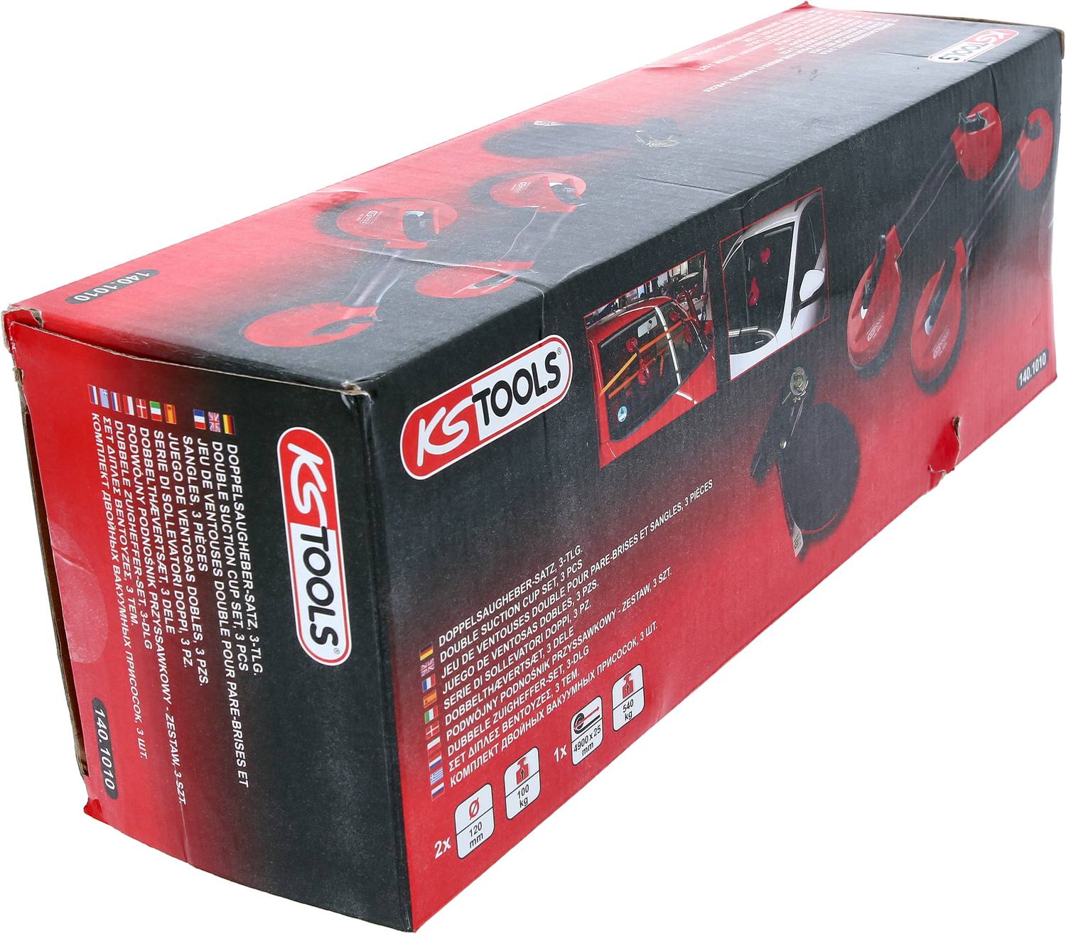 'KS Tools' tool box, red box with pictures of drawing tools, contains a dent repair kit for vehicle bodywork.