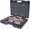 A professional toolbox with several tools, including hammers and metal forms, carefully nestled on foam inserts.