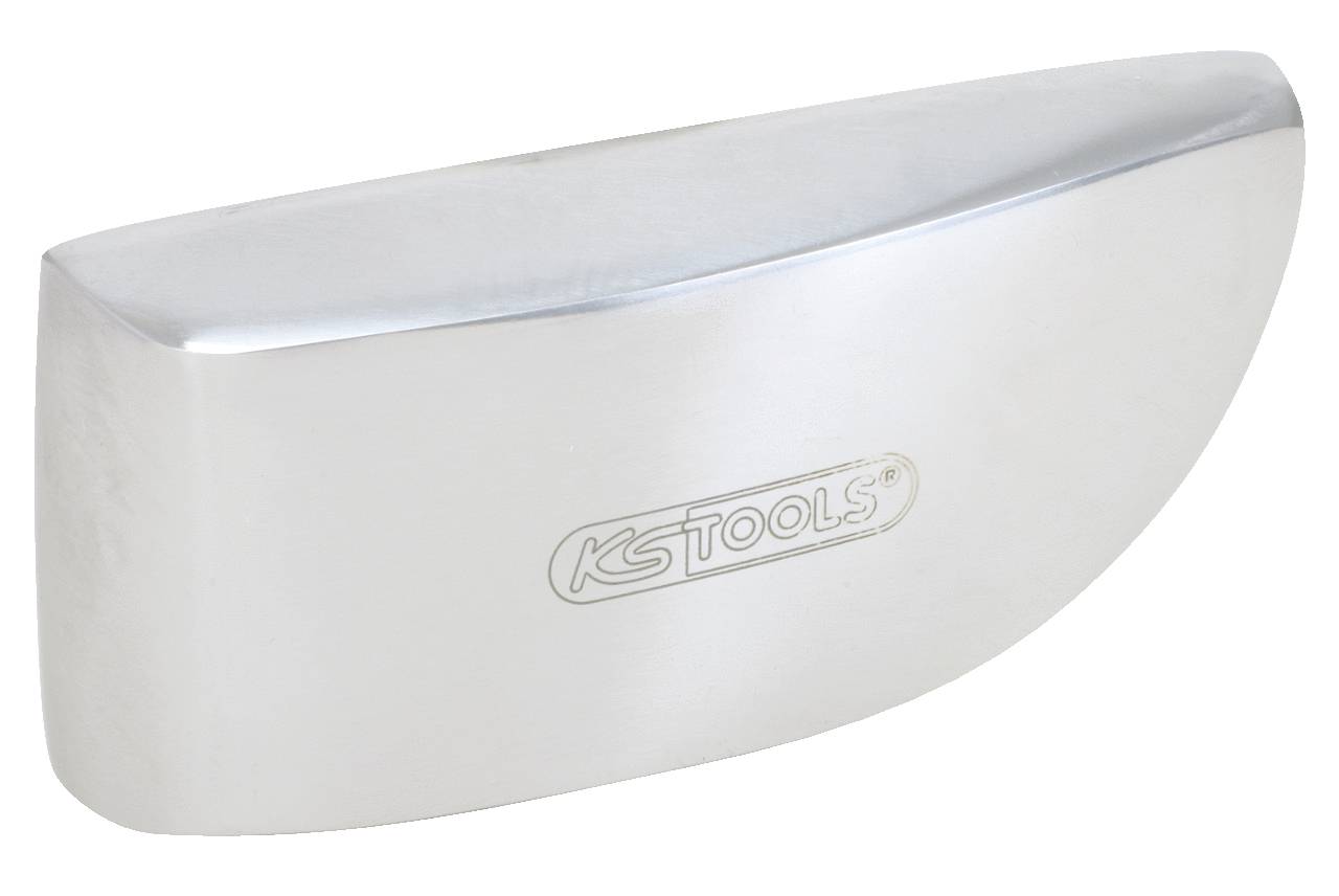 A silver metal wedge with rounded edges and a logo in the centre.