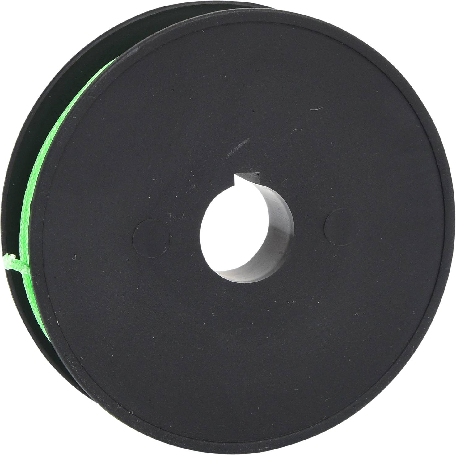 Black plastic reel with green thread.