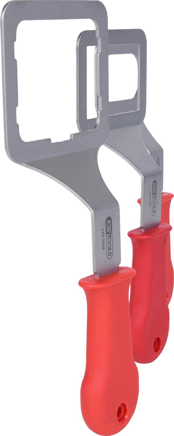 Two red handles with square metal frames on top, used for wall openings or as plasterboard saws.
