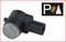 A parking sensor in black with a silver front. A P symbol with colourful lines is located in the top right corner.