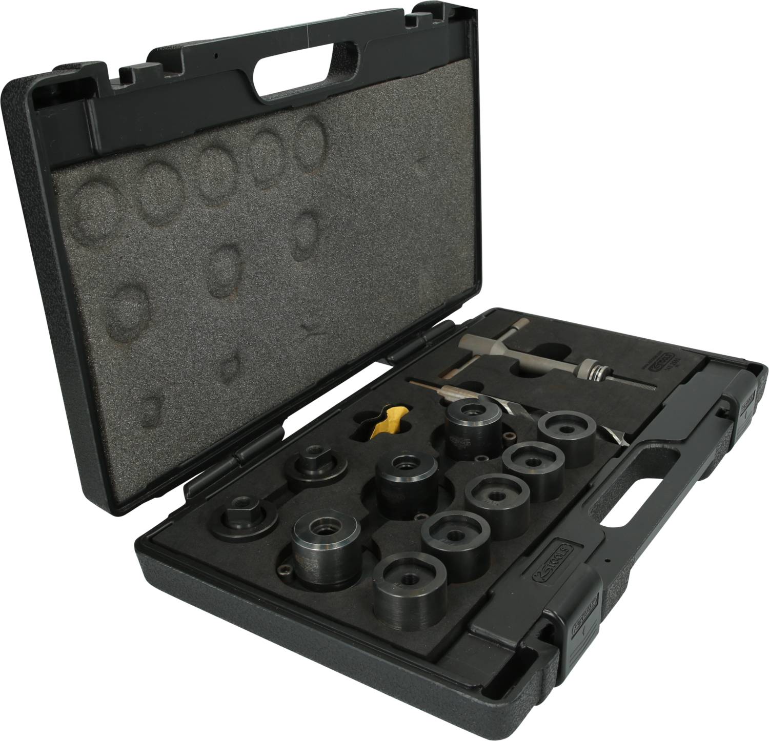 Open toolbox with various circular tools and equipment items in moulded foam compartments.