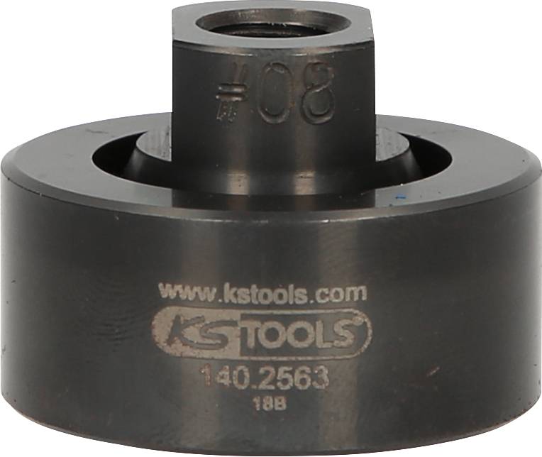 A black metal tool with the inscription 'KS TOOLS 140.2563'. It has a cylindrical shape and a central opening.