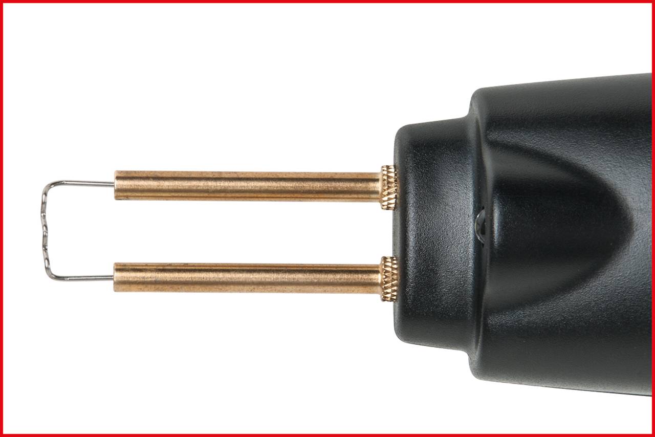 Close-up of an electric soldering iron with two metal rods and a black handle.