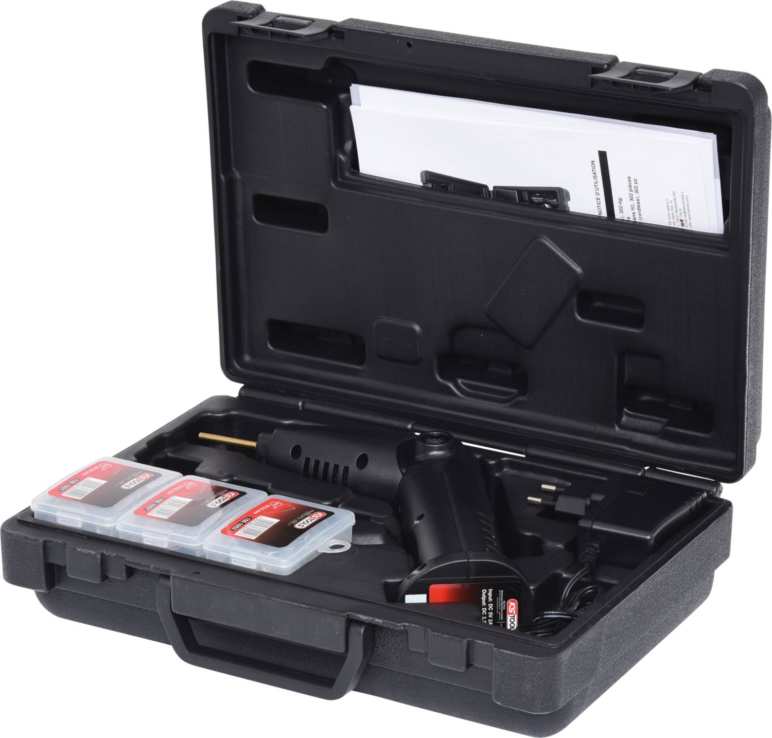 A black tool case containing an electrical device, several accessories, and instruction manuals.
