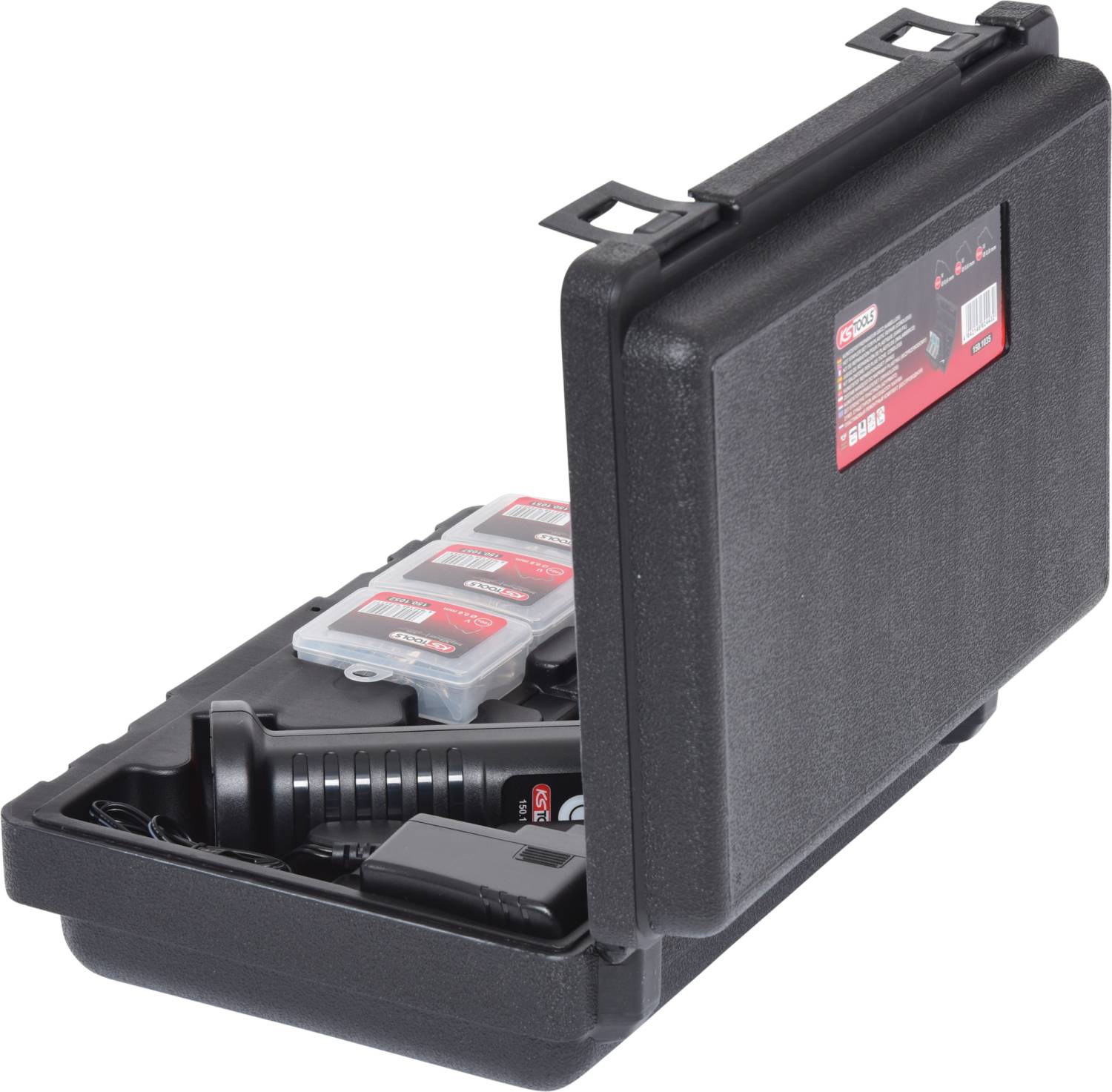 A black suitcase with an open lid. Contains several small boxes and an electrical device with a handle and cable inside.