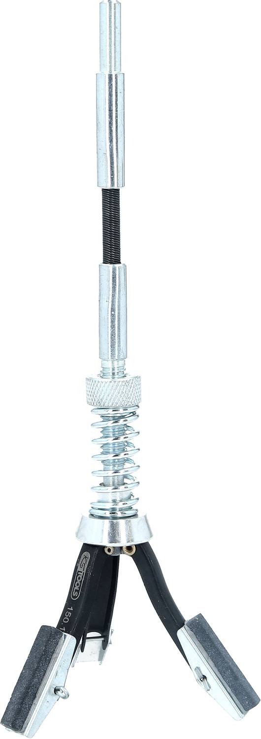 Metallic antenna mount with dual rod and spiral spring in the centre, mounted on a tripod stand.