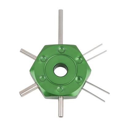 Green, hexagonal hand grip with protruding metal pins, suitable for craftwork or machine operation.