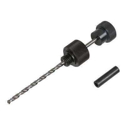 'A drill with a black handle and a removable cylindrical attachment, next to a single black cylindrical attachment.'