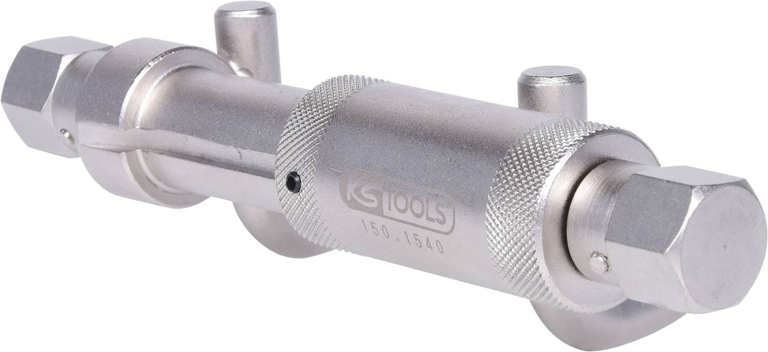 A silver adjustable spanner with two hexagonal heads, used for loosening plumbing fittings.