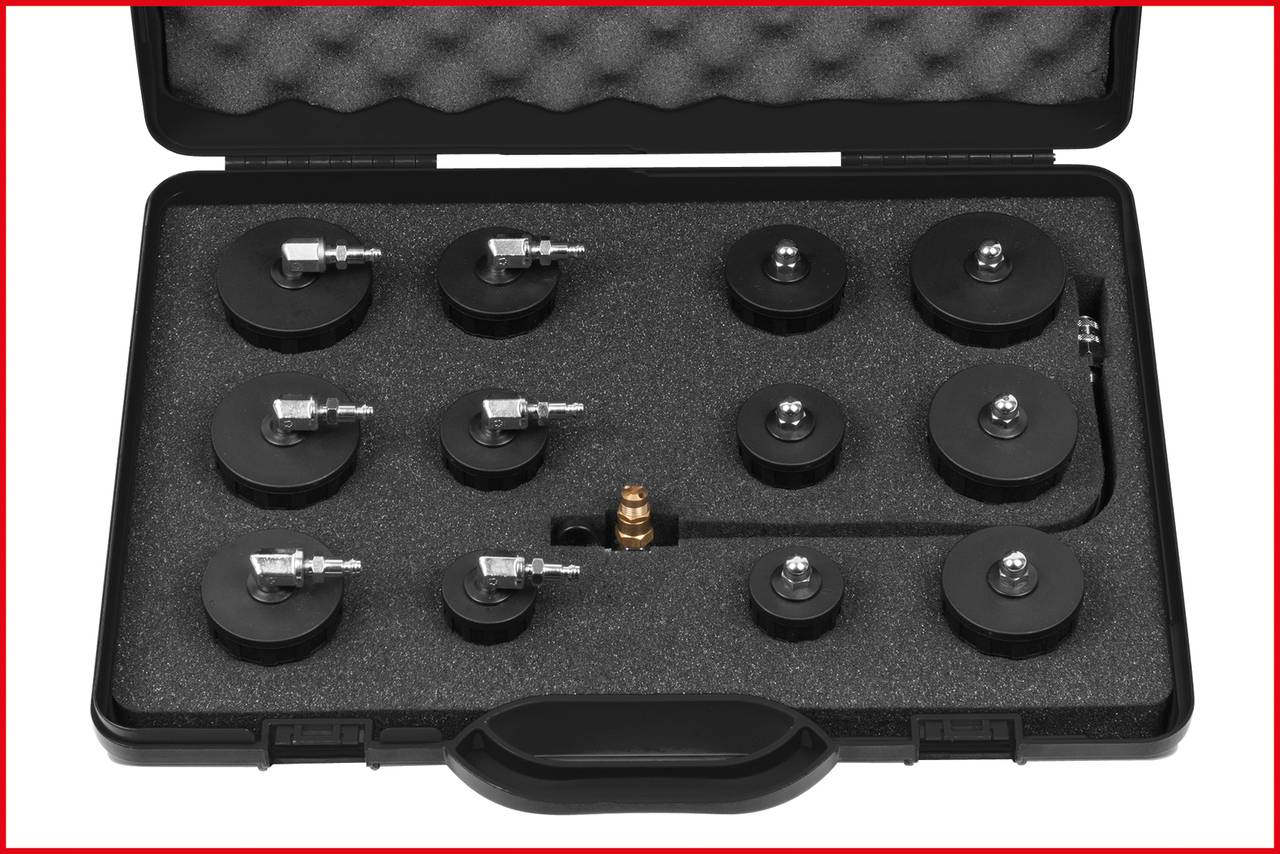 A suitcase with versatile nozzle attachments for various applications. The nozzles are protected in foam inserts.