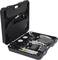 Open black tool case with pressure gauges and hoses, suitable for heating or plumbing installations.