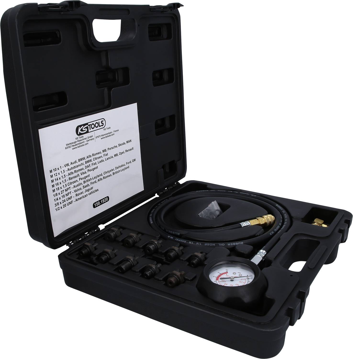 Open black tool case with pressure gauge, hose and nine adapters, for checking pressure in vehicle engines.