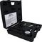 Open black tool case with pressure gauge, hose and nine adapters, for checking pressure in vehicle engines.