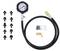 Pressure testing set with pressure gauge, hose and various adapters, for checking pressure in automotive systems.