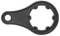 Metal spanner with a round, serrated head and a handle, used for loosening or tightening nuts or bolts.