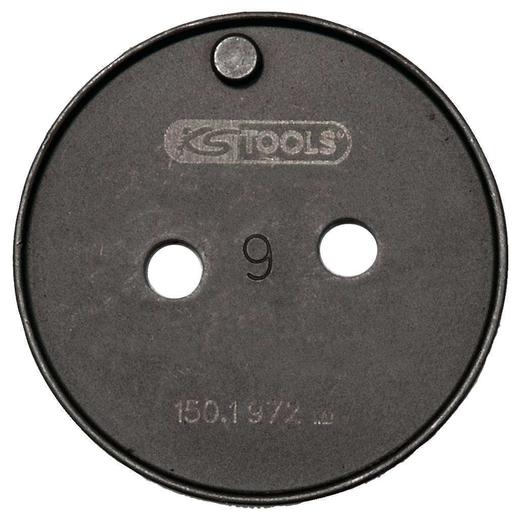 A round, black metal disc with two holes and the inscription 'KS TOOLS' and the number '150.1972'.