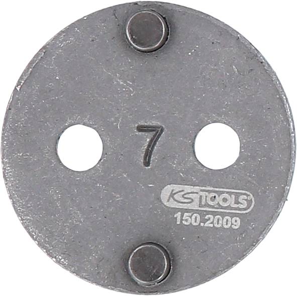 Round metal key with two holes, bearing the number '7' and the inscription 'KS TOOLS 150.2009'.