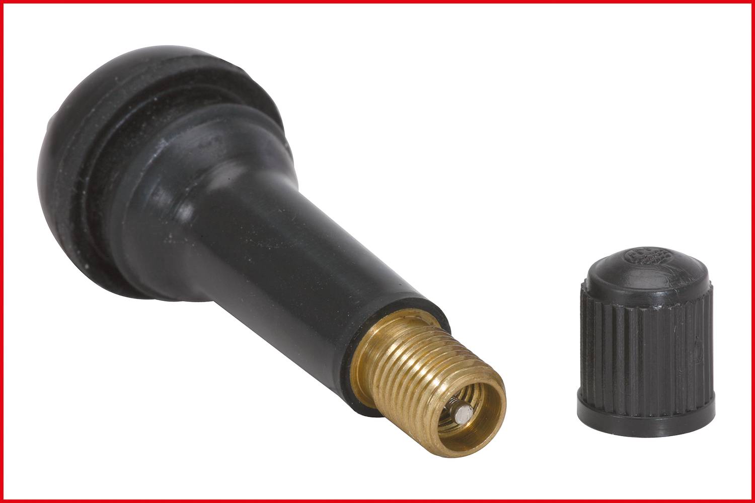 Black car valve with brass thread and removed protective cap beside it.