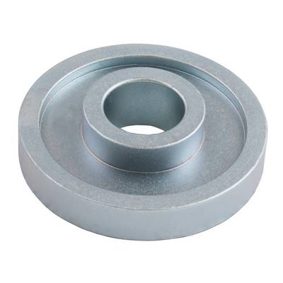 A silver, round metal part with a cylindrical protrusion in the centre.