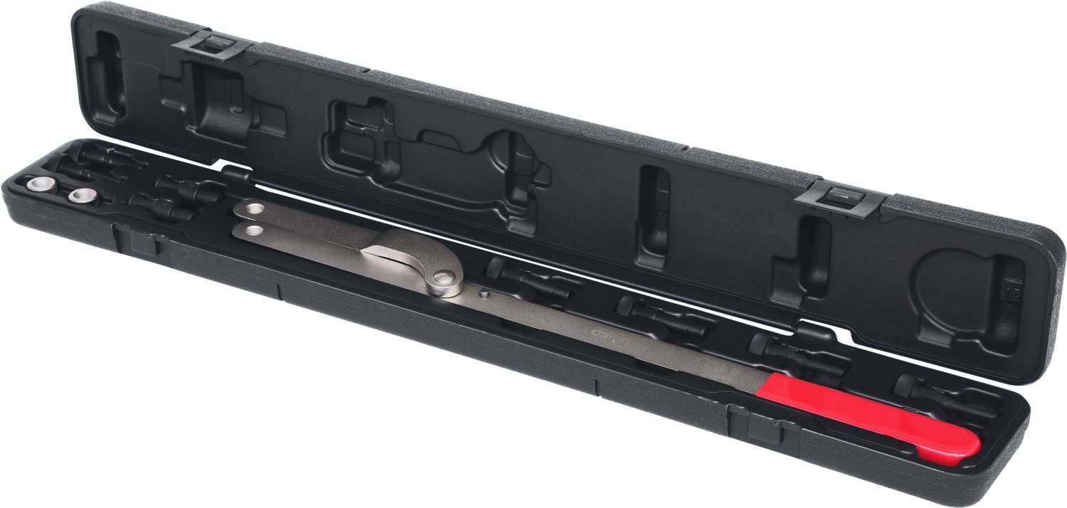 A black toolbox with a long, thin tool with a red handle, likely a specialist tool for mechanical work.