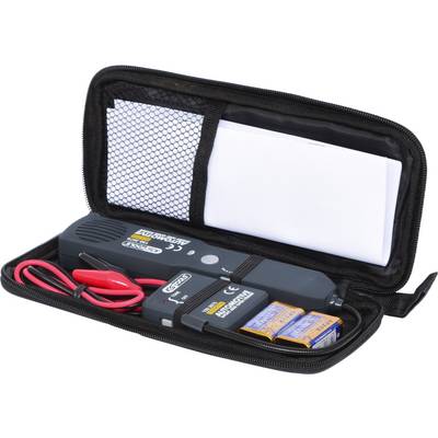 An electronic testing device in an open black case. Contains batteries, cables, and an instruction manual.