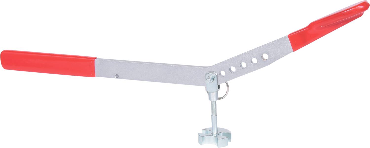 A metal spanner with red handles, used for adjusting water pipes or plumbing.