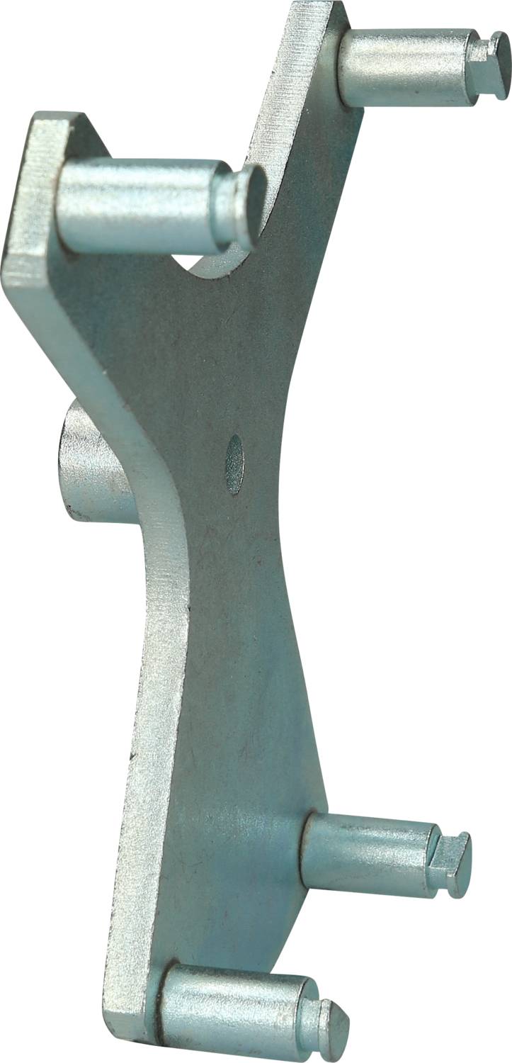 A metal tool with an X-shape and four protruding pins at the ends, potentially used for assembly or fastening.