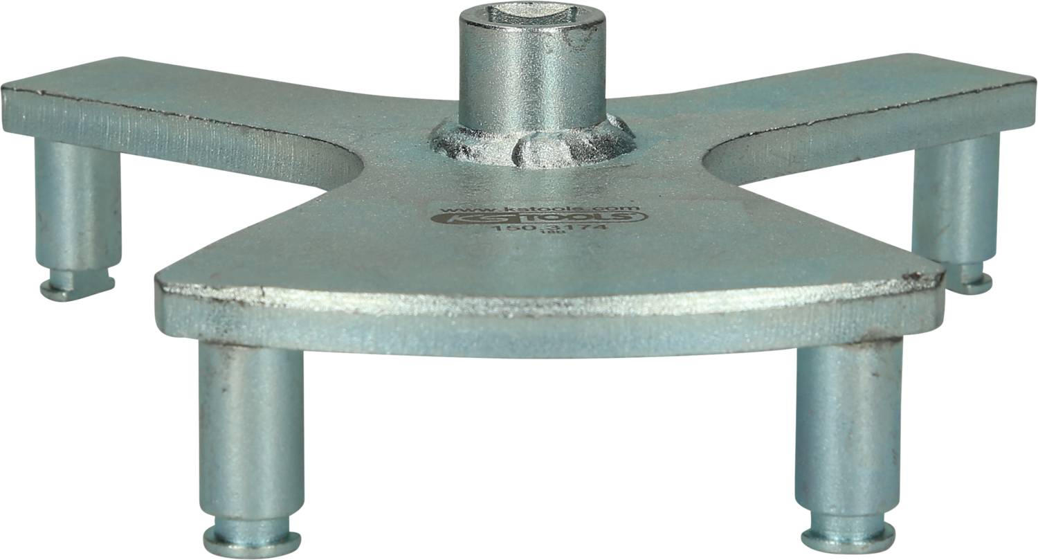 Metallic mechanical component with a cross-shaped base and four downward-facing supports, potentially a mounting element.