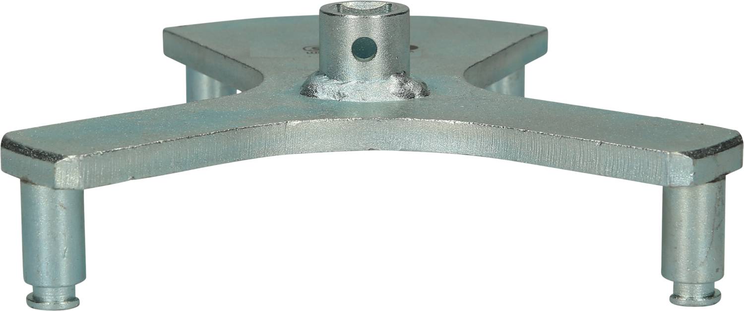 A metallic, three-legged tool with a central opening, possibly an accessory for assembling or disassembling components.