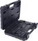 'Open black tool case with a set of spanners, arranged by size, on a textured interior surface.'