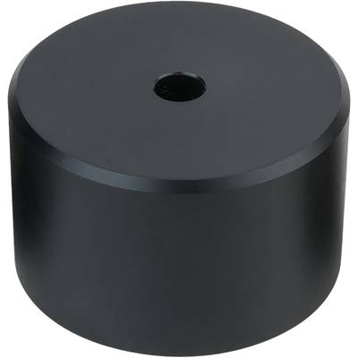 Black, cylindrical metal block with central hole, surface matte.