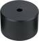 Black, cylindrical metal block with central hole, surface matte.