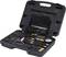 An opened black case with a comprehensive tool set, including various nozzles, hoses, and a pressure gauge.