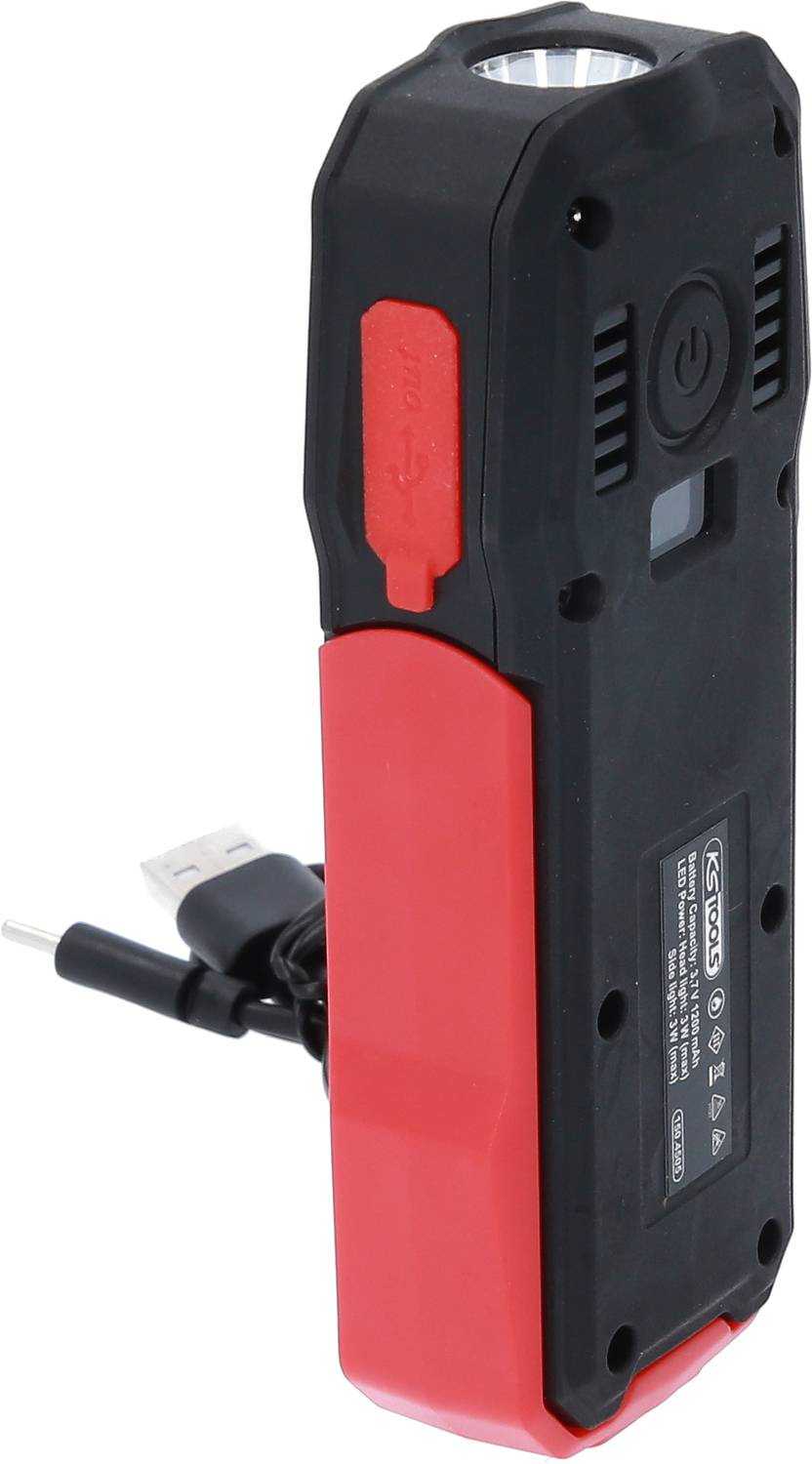 A black and red portable light device with USB port and switch button, suitable for use in dark environments.