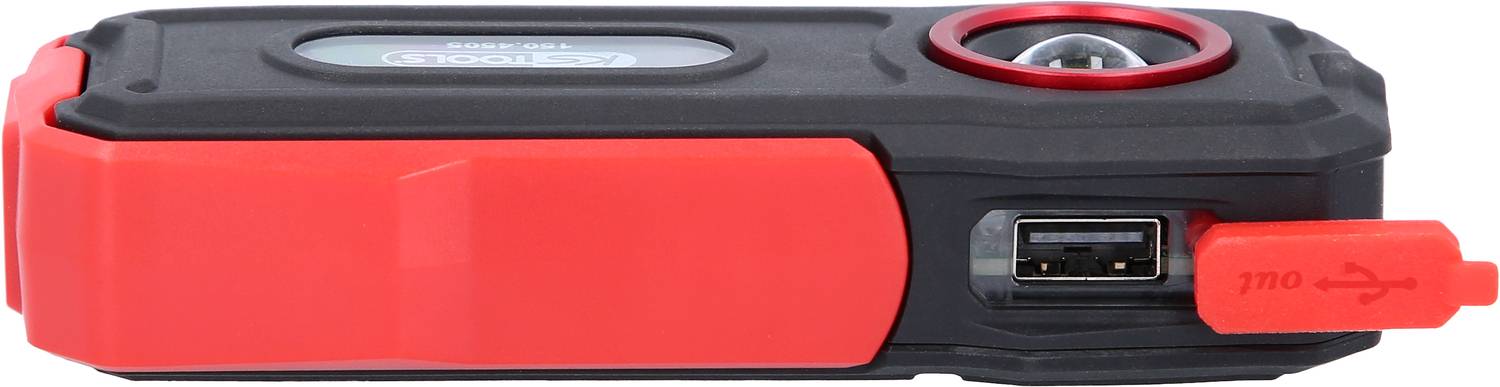 A portable charger with a black casing and red accent, showing a USB port with a protective cover.