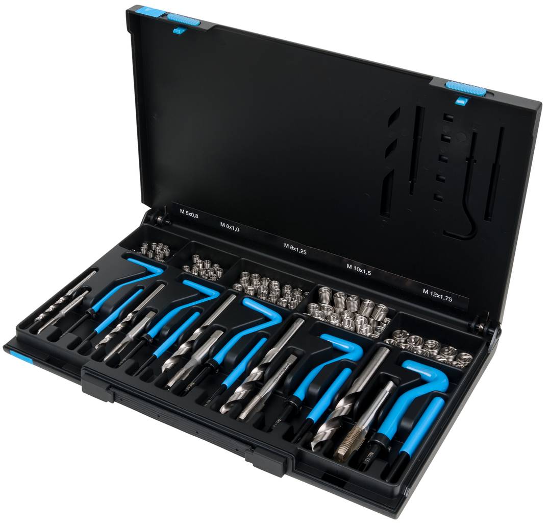 Drill bit set in an opened black box with various drill bit sizes and blue hexagonal keys, organised in compartments.