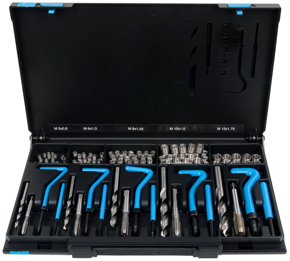 A set of thread repair tools in an open case, including drill bits, tap and inserts in various sizes.