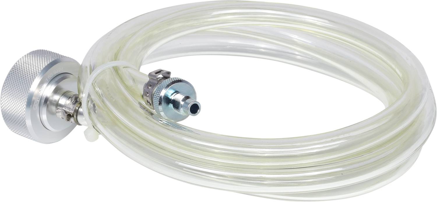 A transparent rubber hose with metal connector and clip, coiled.