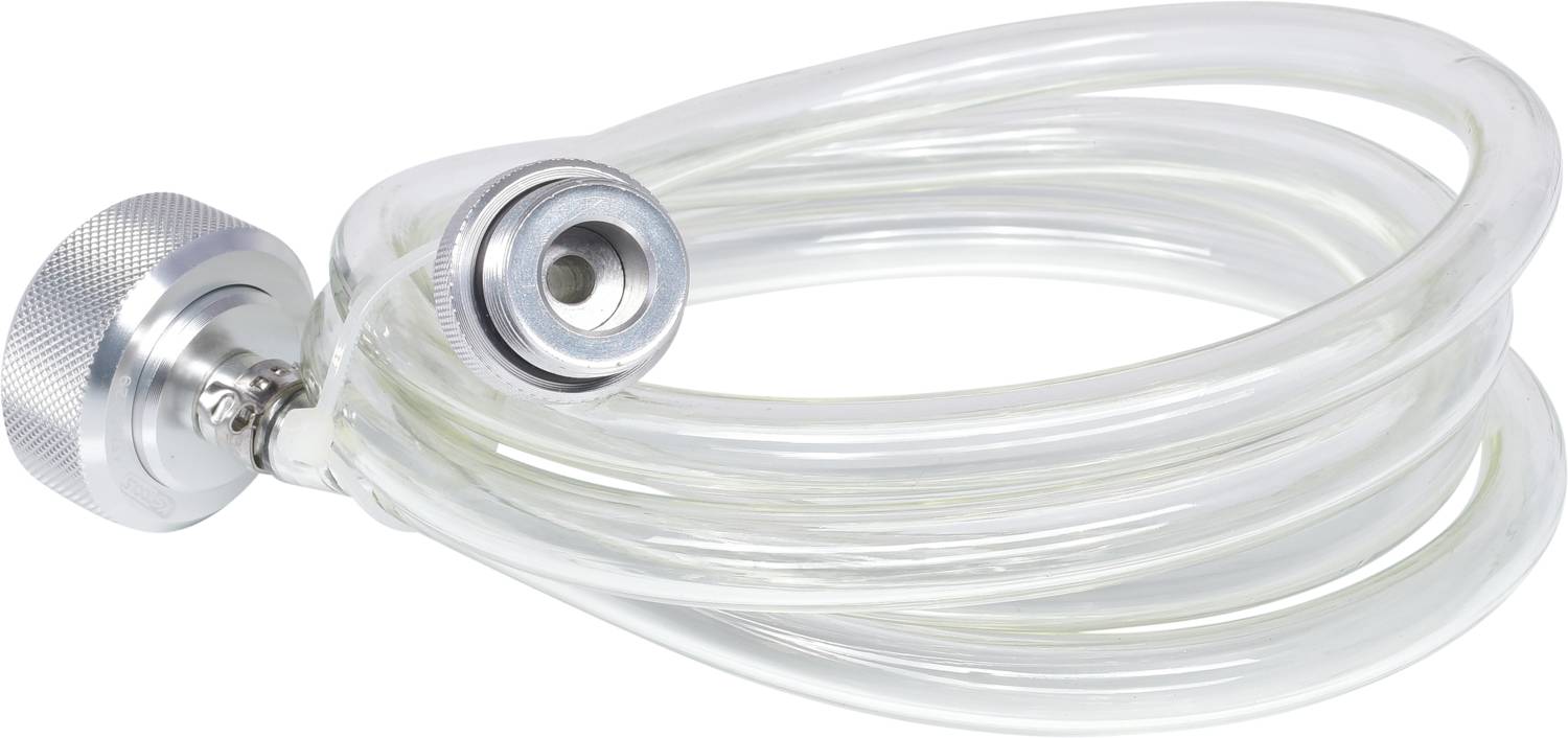 Transparent plastic tube with a silver connector, coiled and lying on its side. Used for liquid transfer.
