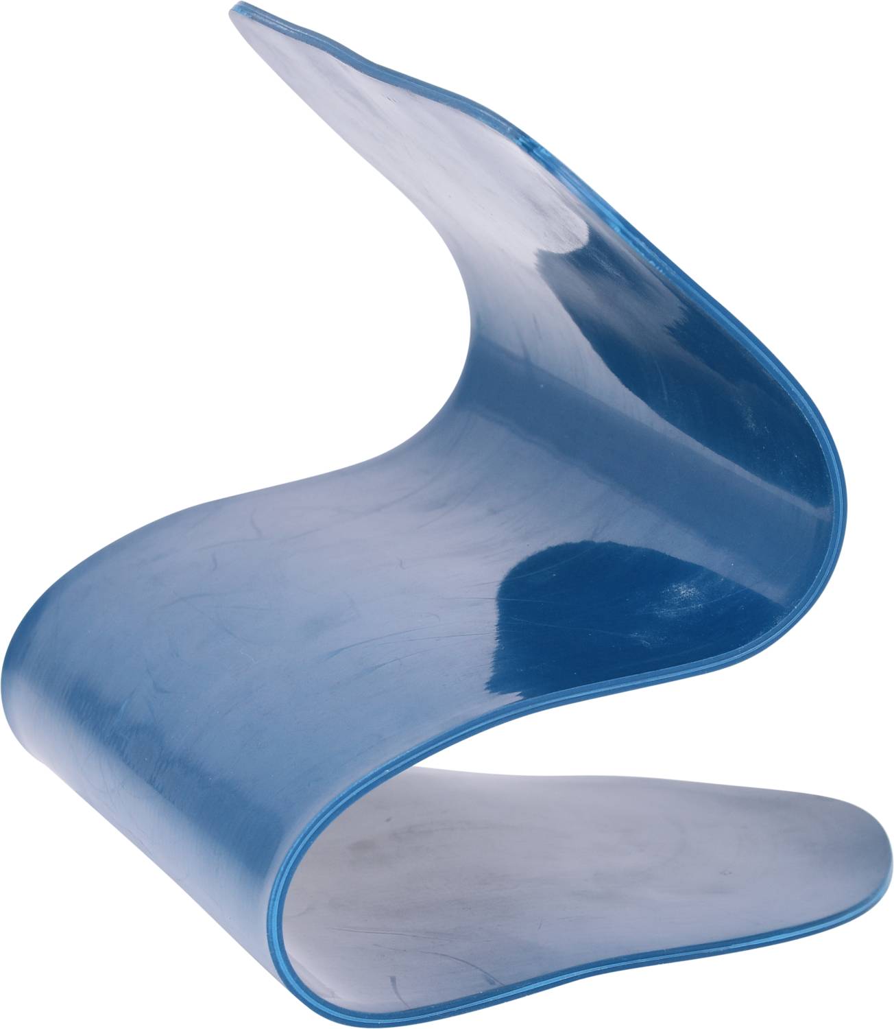 A blue, wave-shaped chair without legs stands alone, showcasing a modern design with a curved backrest.