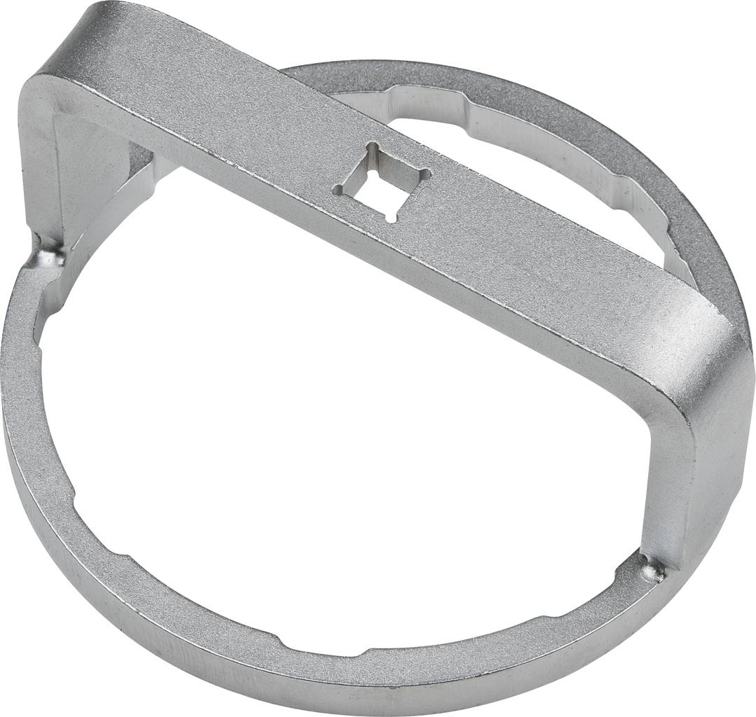 A silver metal ring with a raised crossbar and a small rectangular hole in the centre.