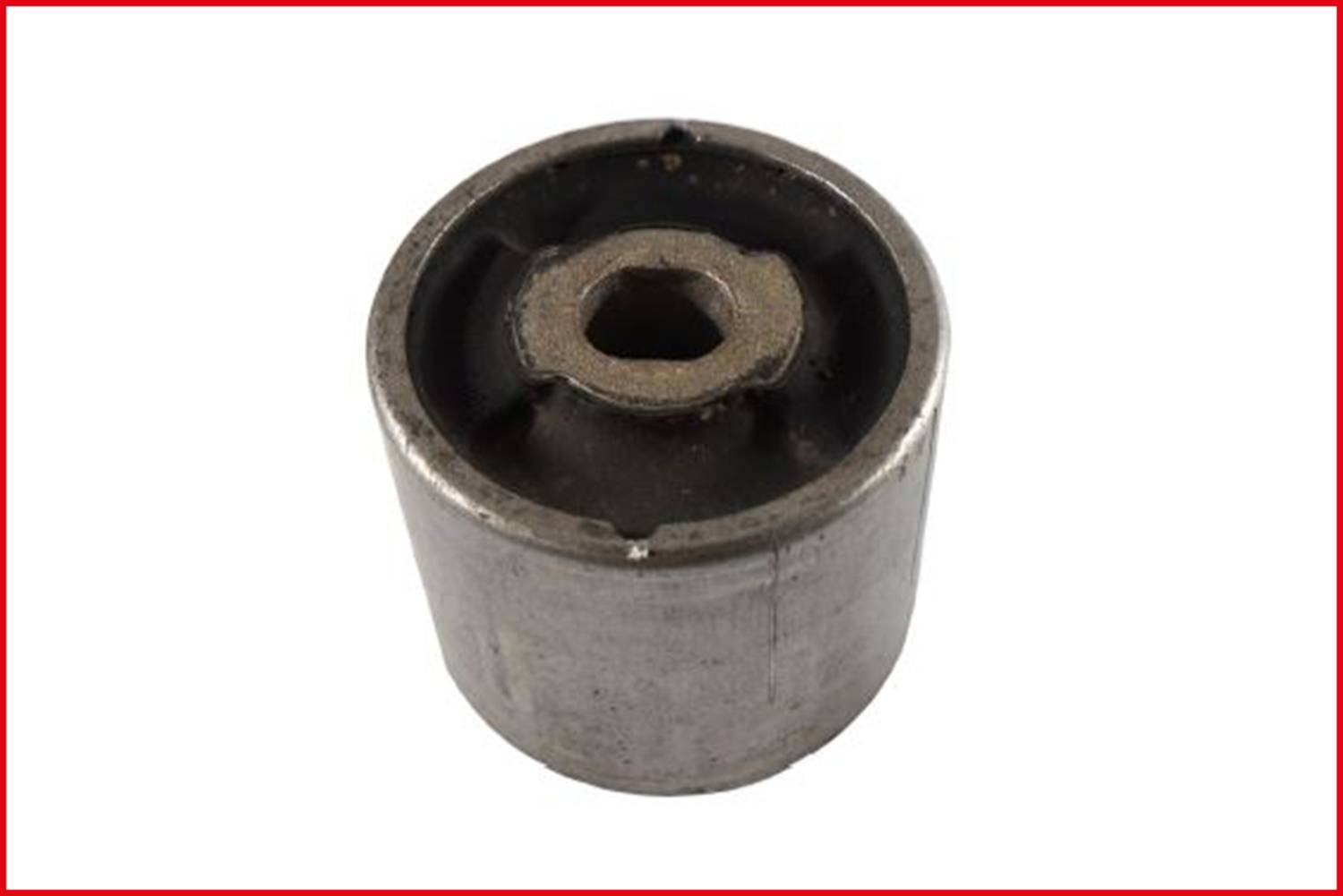 A round metal container with a polygonal hole in the centre, set against a white background.