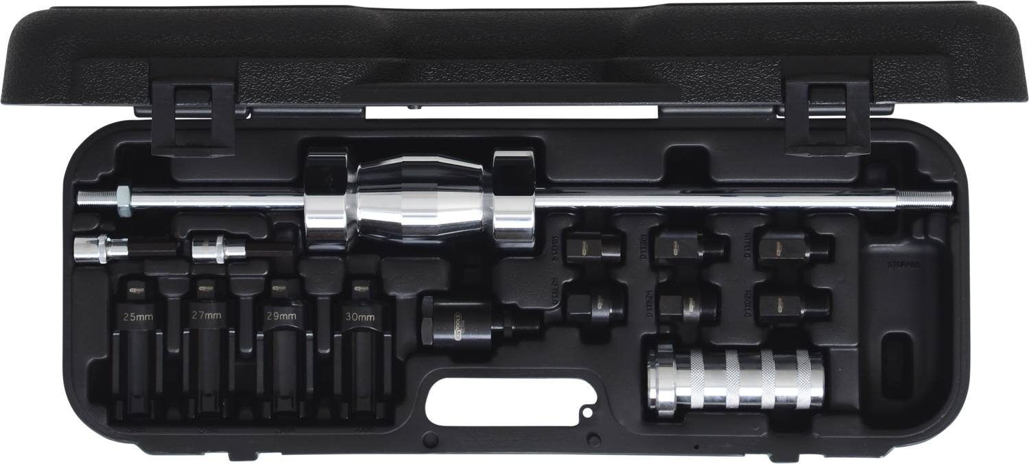 A suitcase containing a puller set, comprising various tool components such as a hammer, extensions, and attachments.