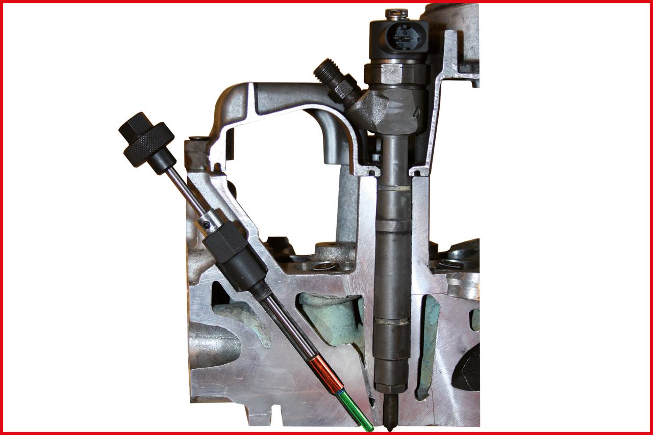 Cross-sectional view of an engine with injection nozzles and valves. Displays technical details of engine components in section.