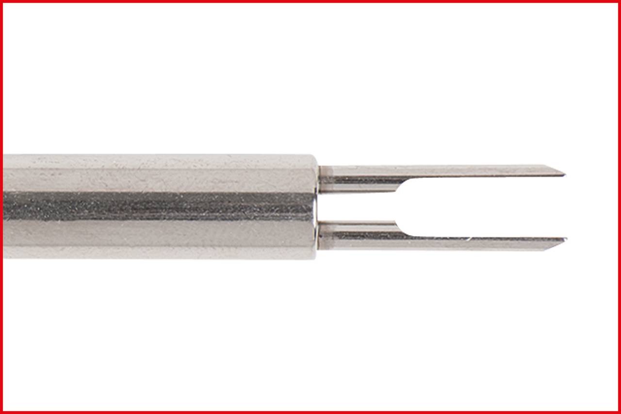 A metallic tool with two prong-like tips in close-up. Primarily used in technical or craft applications.